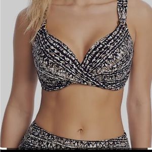 Miracle Bra bikini barely worn.  Top is 36D bottoms are size 12. Amazing support